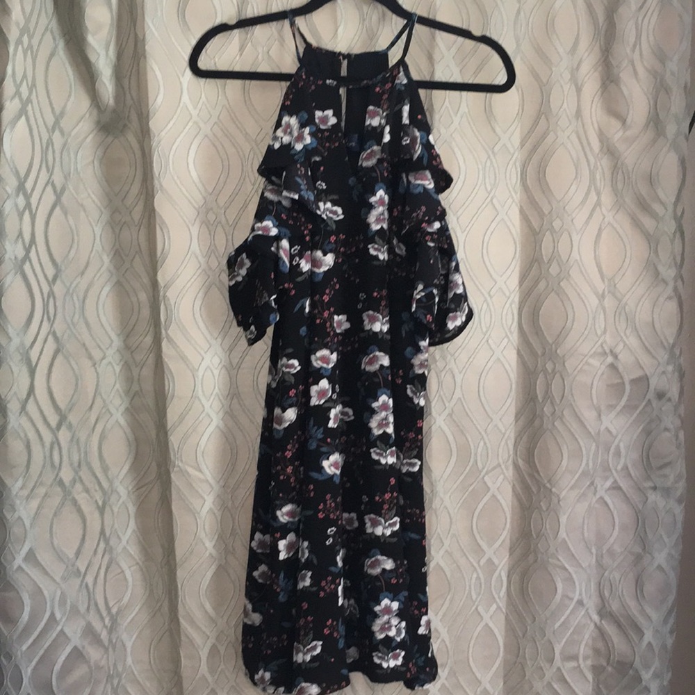 Brand: Blue Rain from Francesca’s. Size:Large Color: Black with floral pattern